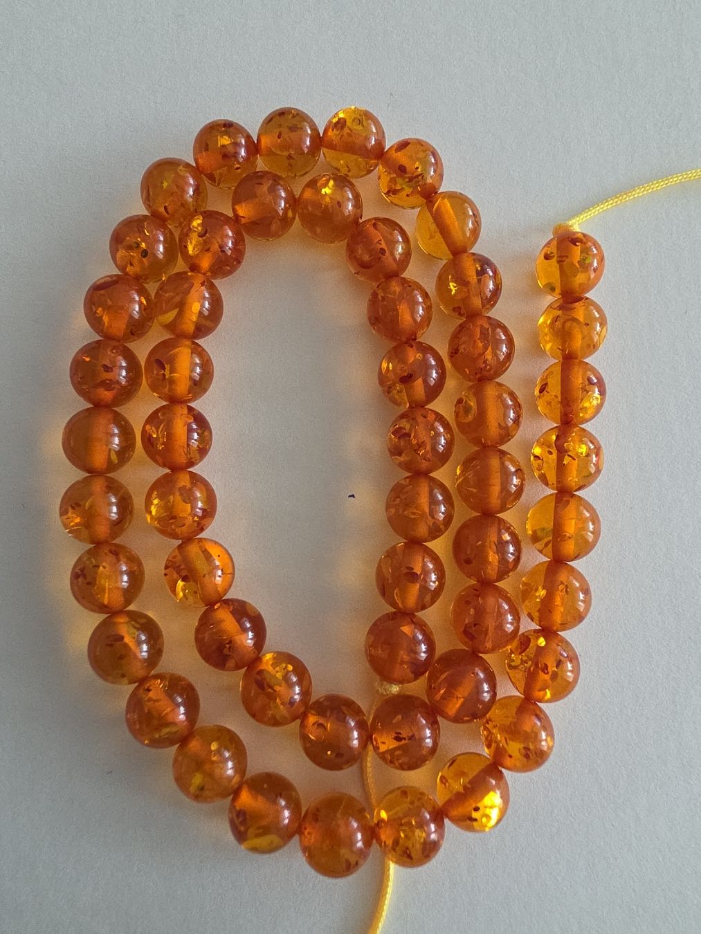 Minerali & Pietre curative: Bernstein gelb/orange 8mm. Strang – Nuovo e nell'imballaggio originale da Menziken venduto da Mirager 1