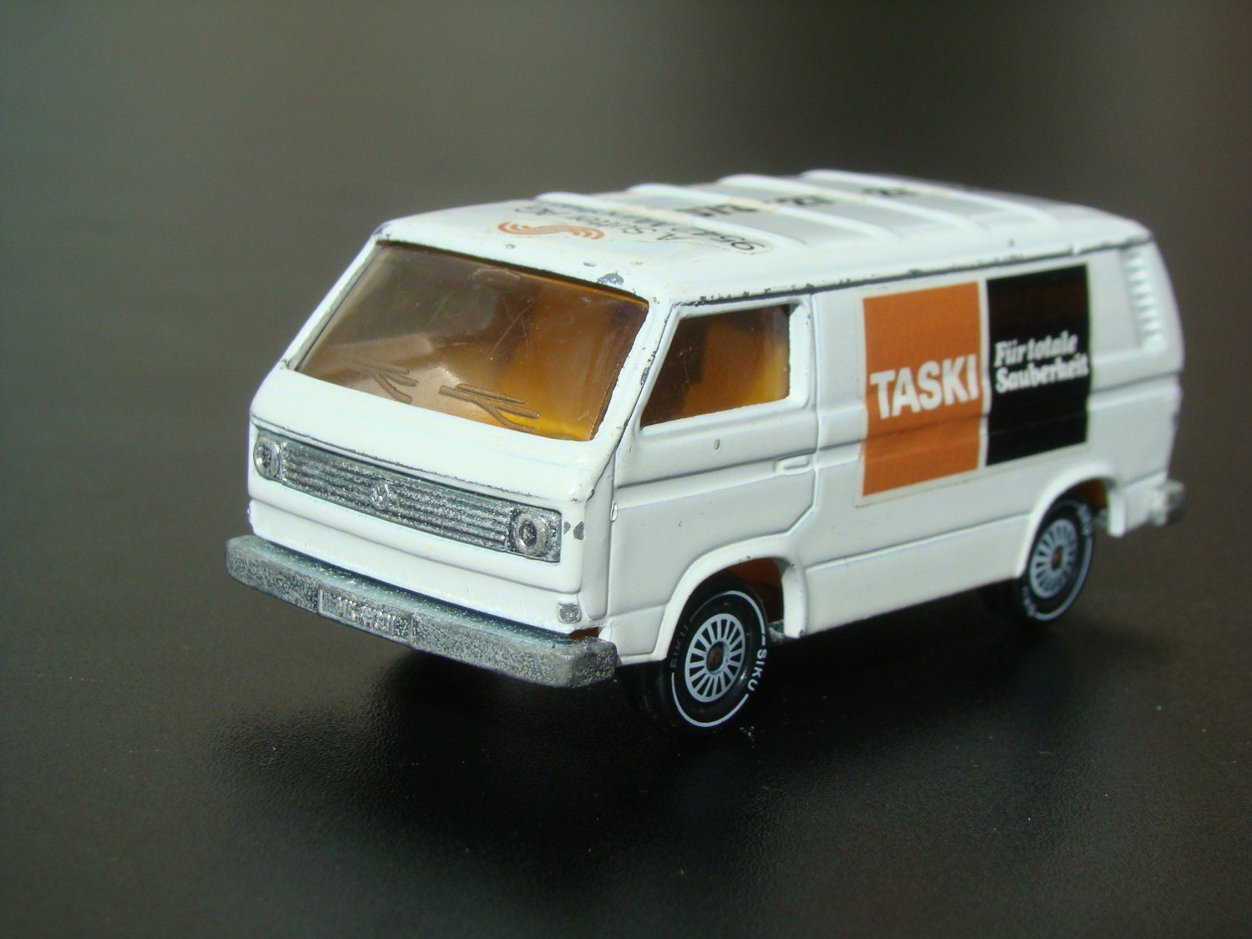Siku Modellini d'auto: Siku VW Transporter Taski Sutter Münchwilen selten – Usato da Walzenhausen venduto da Vanquish711 1