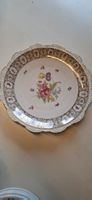 Assiette en porcelaine de Bavière motif floral doré