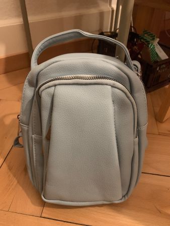 Neuwertiget Mini Rucksack hellblau