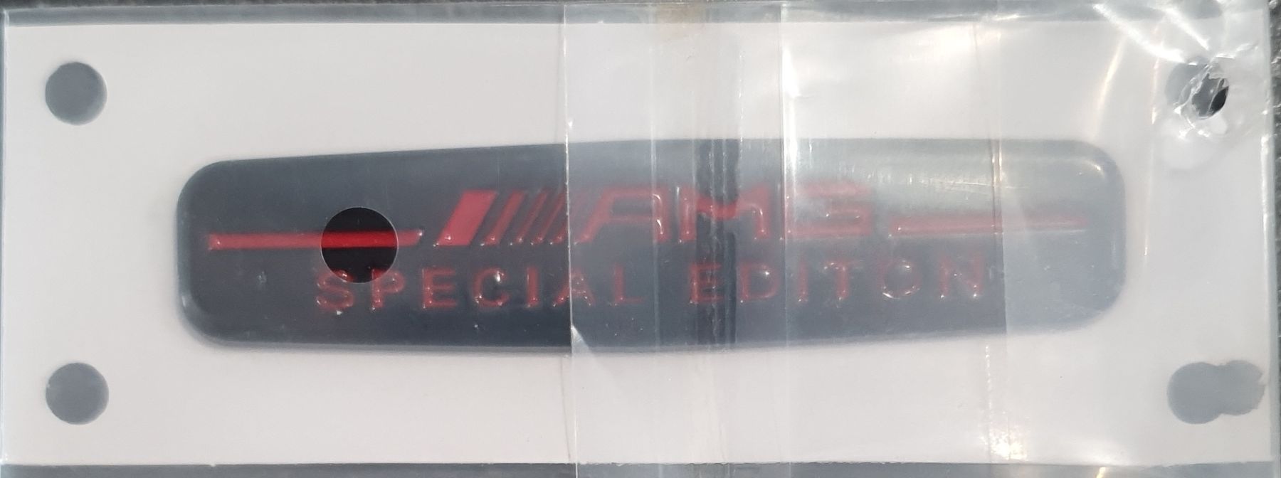 Mercedes-Benz Toutes les pièces auto: Emblème AMG SPECIAL EDITION noir/rouge – Neuf avec emballage d'origine à Anières par Relka2000