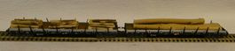 2 Stk Rungenwagen mit Holzladung