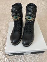 Bottes femme noires ornées œil strass taille 38 neuves
