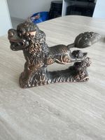 Feuerzeug mit bronzenem Löwenmotiv