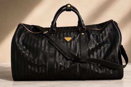 Reisetasche Maison Mollerus schwarz/gold Neuwertiger Zustand