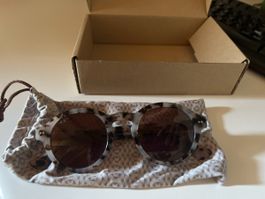 Kapten and son Brille