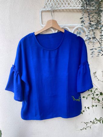 Haut femme bleu taille M manches volantées occasion