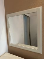 Small mirror with white frame