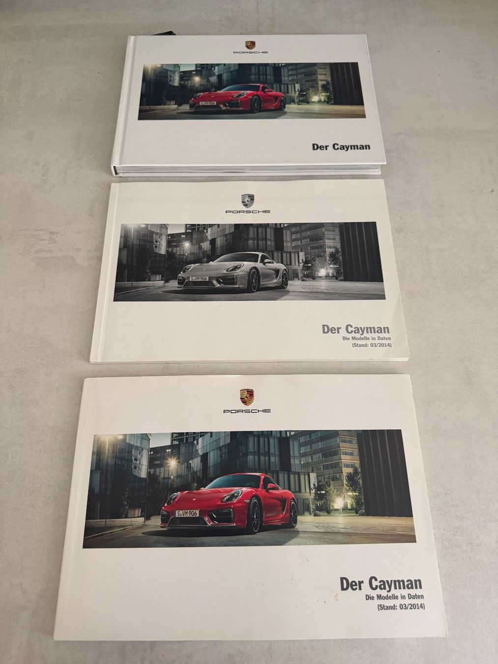 Porsche Documents: 3 Kataloge Porsche Cayman – D'occasion à Geroldswil par Jeremy11