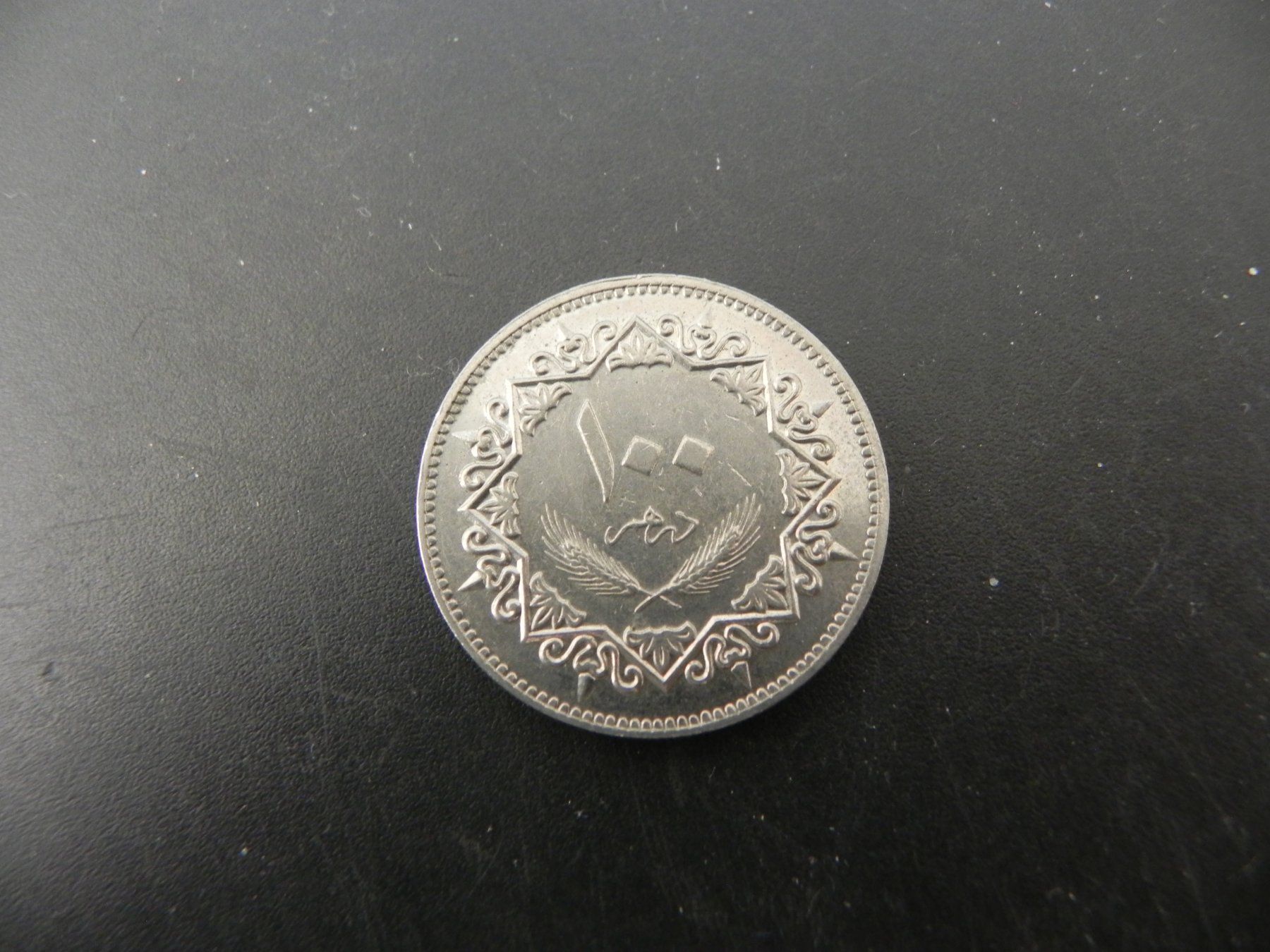 Toutes les monnaies: Libyen 100 Dirham 1975 – D'occasion à Biel/Bienne par Gogolozi