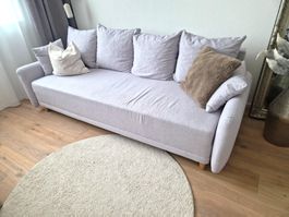 Schlafsofa Grau – bequem, ausziehbar und mit Stauraum