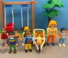 Playmobil 8 Figuren mit kleinem Spielplatz