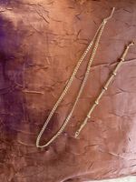 Schmuckset Armband und Halskette aus silbernem Metall