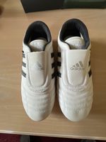 1 paire de chaussures Adidas taille 36.5 blanc selon pho