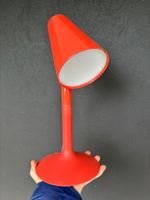 Philips Lirio Piculet LED table lamp in coral red