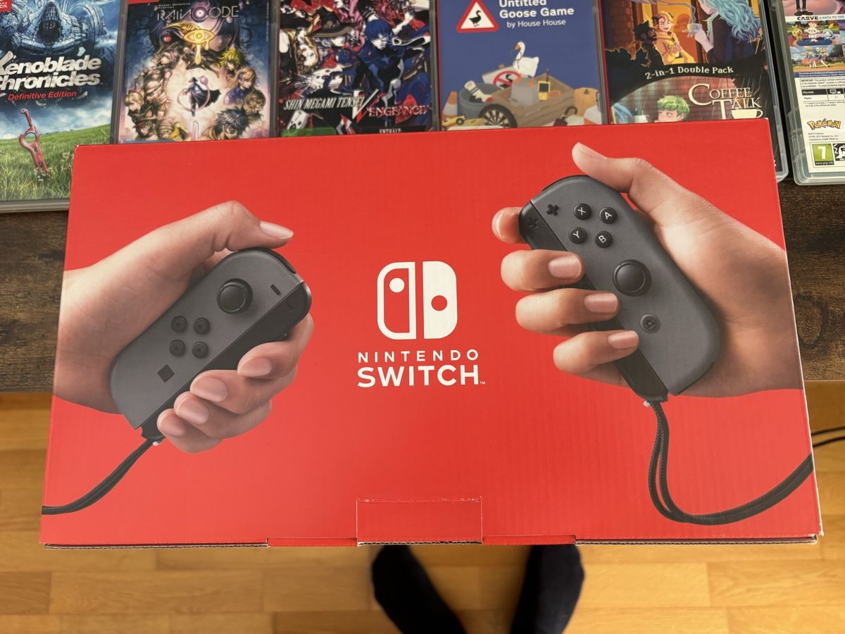 Nintendo Console: Nintendo Switch mit diversen Spielen und zwei pro Controller – Usato da Ipsach venduto da seb_2p9q 5
