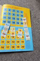 Coop Splash Sammelkarte mit 12 Klebern