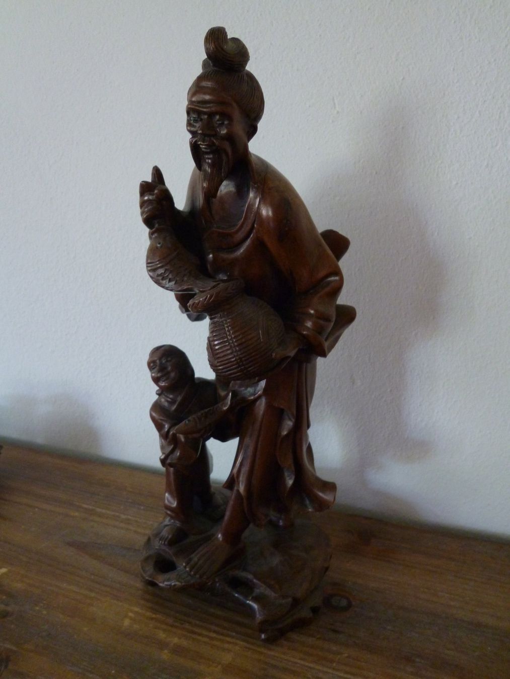 Sculptures & Statues: geschnitzte Holzfigur Mann mit Kind  chinesische Kunst – D'occasion à Dättlikon par Mamakuga 1
