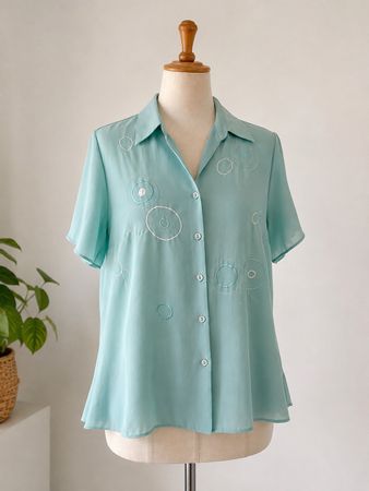 Sommerliche Bluse in Mintgrün mit einzigartigem Design Gr.42