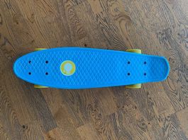 Planche à roulettes bleues pour enfants