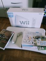 Console Wii avec jeux et accessoires bon état