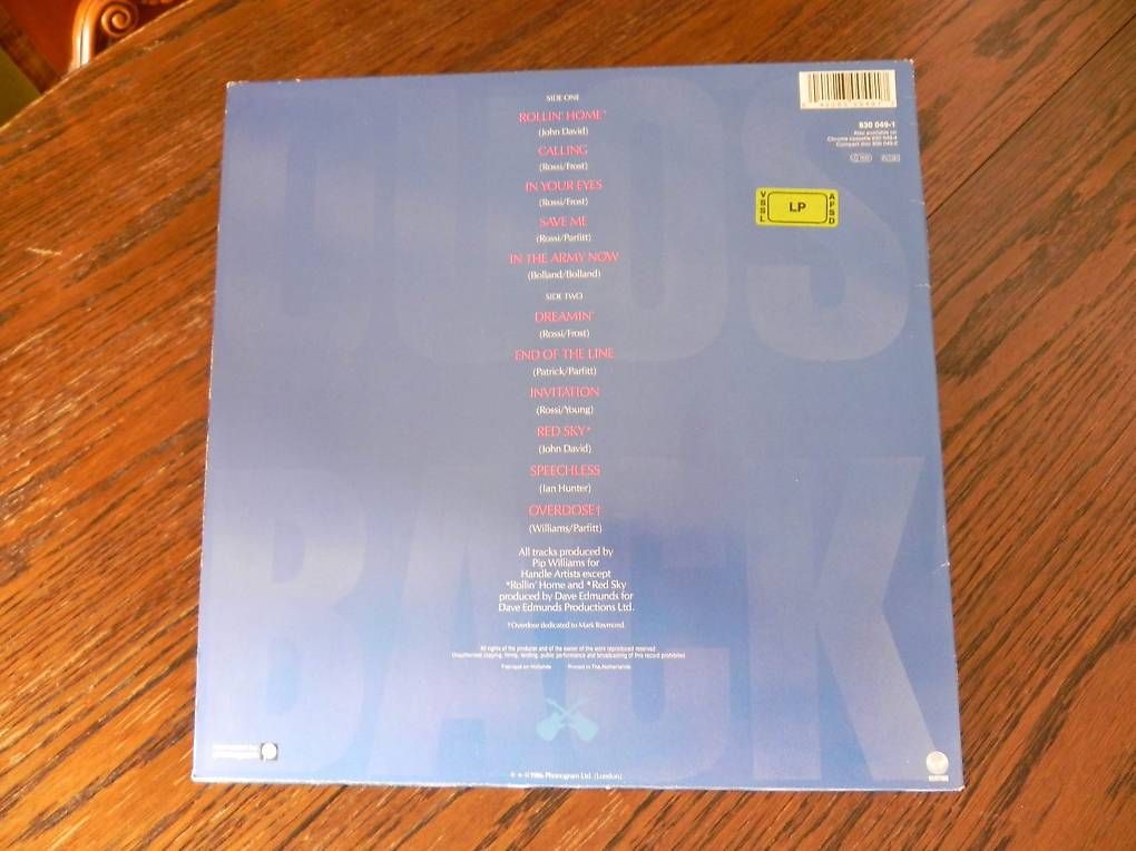 Schallplatten: Disque vinyle Status Quo "In The Army Now" – Gebraucht aus la Chaux-de-Fonds von Lampe 1