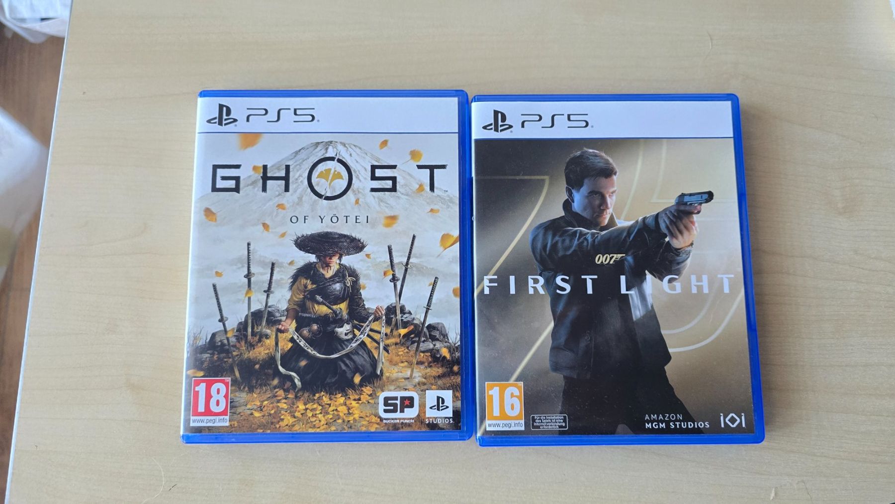 Sony Konsolen: 2 games PS5 + Sony DualSense Charging Station – Gebraucht aus Rennaz von DYL-HOOKYE