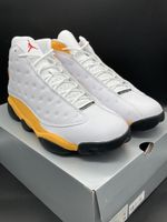 Baskets Jordan rétro, blanches et dorées taille 40