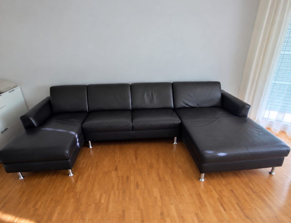 Sofas: Leder Ecksofa dunkelbraun mit Ottomane gebraucht – D'occasion à Spiegel b. Bern par DDML-3000
