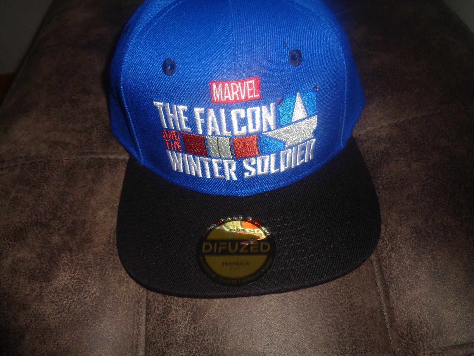 Hüte, Mützen & Caps: Marvel - Winter Soldier - Logo Snapback – Neu und originalverpackt aus Olten von Disc-Ausverkauf
