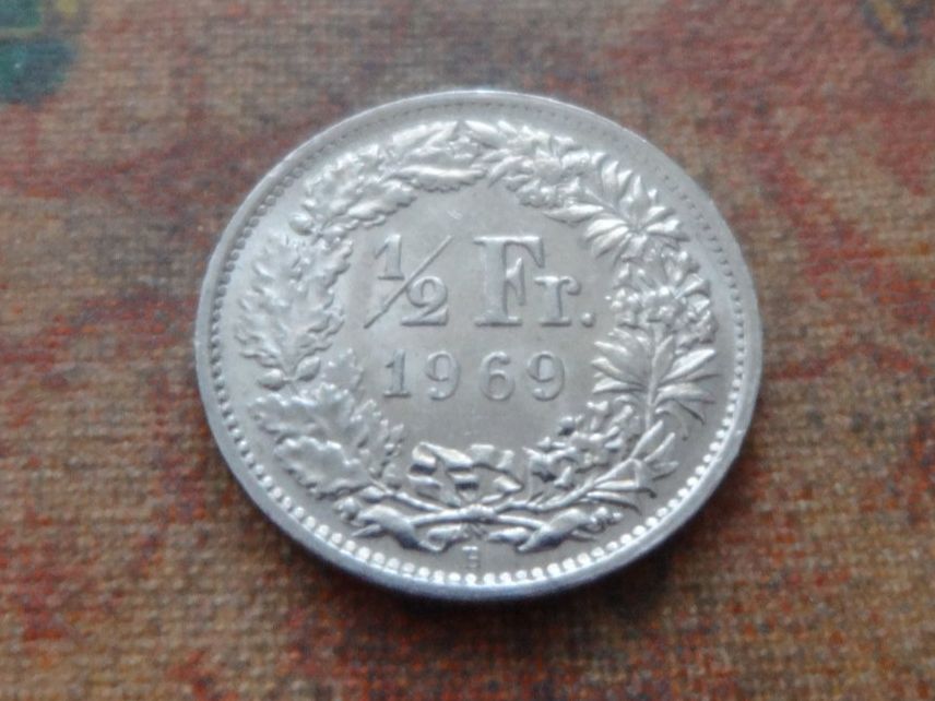 Tutti le monete: 1/2 Fr. 1969 – Usato da Romanel-sur-Lausanne venduto da Swift13