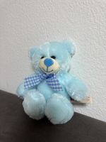 Plüschbär hellblau mit karierter Schleife  