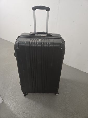 Black hard shell suitcase