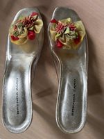 1 paire de chaussures taille 40 selon photos
