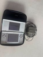Nintendo DS Lite grise - Avec étui et chargeur - Bon état