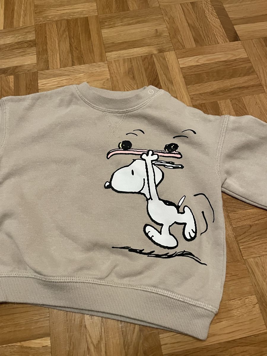 H&M Pulls et sweat-shirts: Pull H&M Bébé Snoopy PEANUTS, 6-9 mois – Neuf (Voir description) à Versoix par Pti-pois 1
