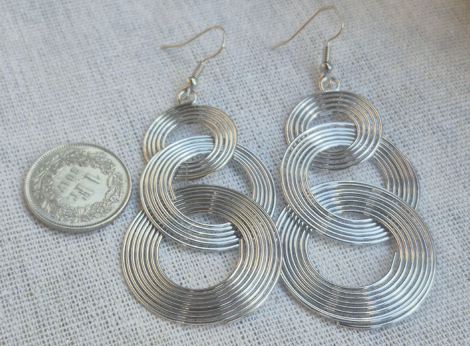 Boucles d'oreille: Orecchini pendenti cerchi a spirale colore argento – Neuf (Voir description) à Giubiasco par Stefaniav 2