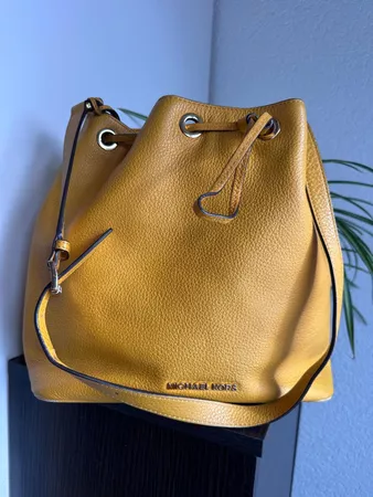 Sac bourse Michael Kors cuir jaune bon état général
