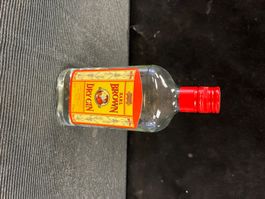 DRY GIN ANCIENNE BOUTEILLE ENTAMÉE