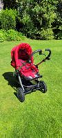 Roter Kinderwagen