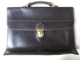 gebrauchte schwarze Ledermappe