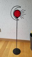 Schöner Kerzenständer mit Mond und Sonne