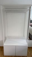 Open wardrobe from IKEA white with storage cabinet used