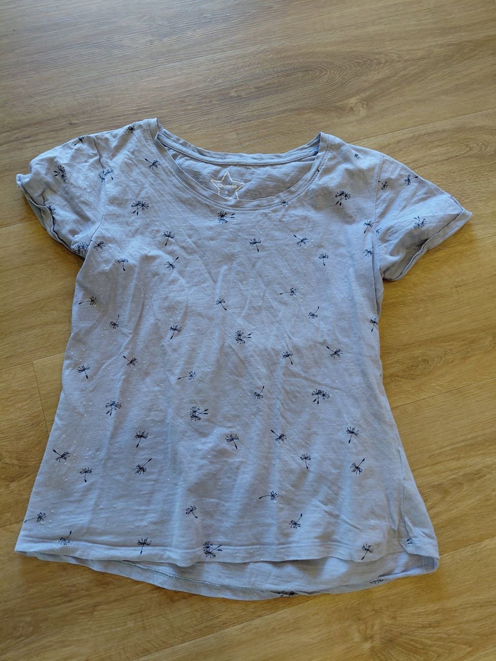 Camicette, T-shirt & Top: Hellblaues T-Shirt mit Pusteblumenmuster – Usato da Roggwil BE venduto da Chrischu83