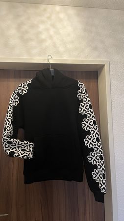Maglione con cappuccio