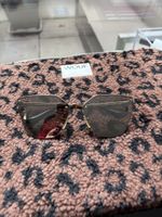 Lunettes de soleil Prada