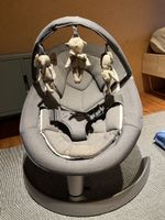 Nuna Leaf Babyschaukel mit Spielbogen und Spielzeug!