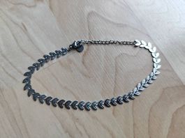 Neue Fusskette