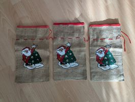 3 bedruckte Samichlaussäcke aus Jute