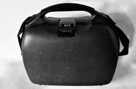Samsonite-Reisekoffer aus Hartschale für Kosmetikartikel.